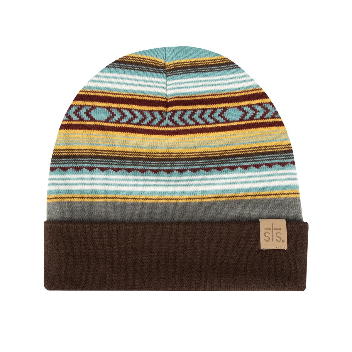 A striped beanie hat with a mix of geometric patterns, predominantly in blue and brown colors, with a brown fold over edge and a brand patch on the side.