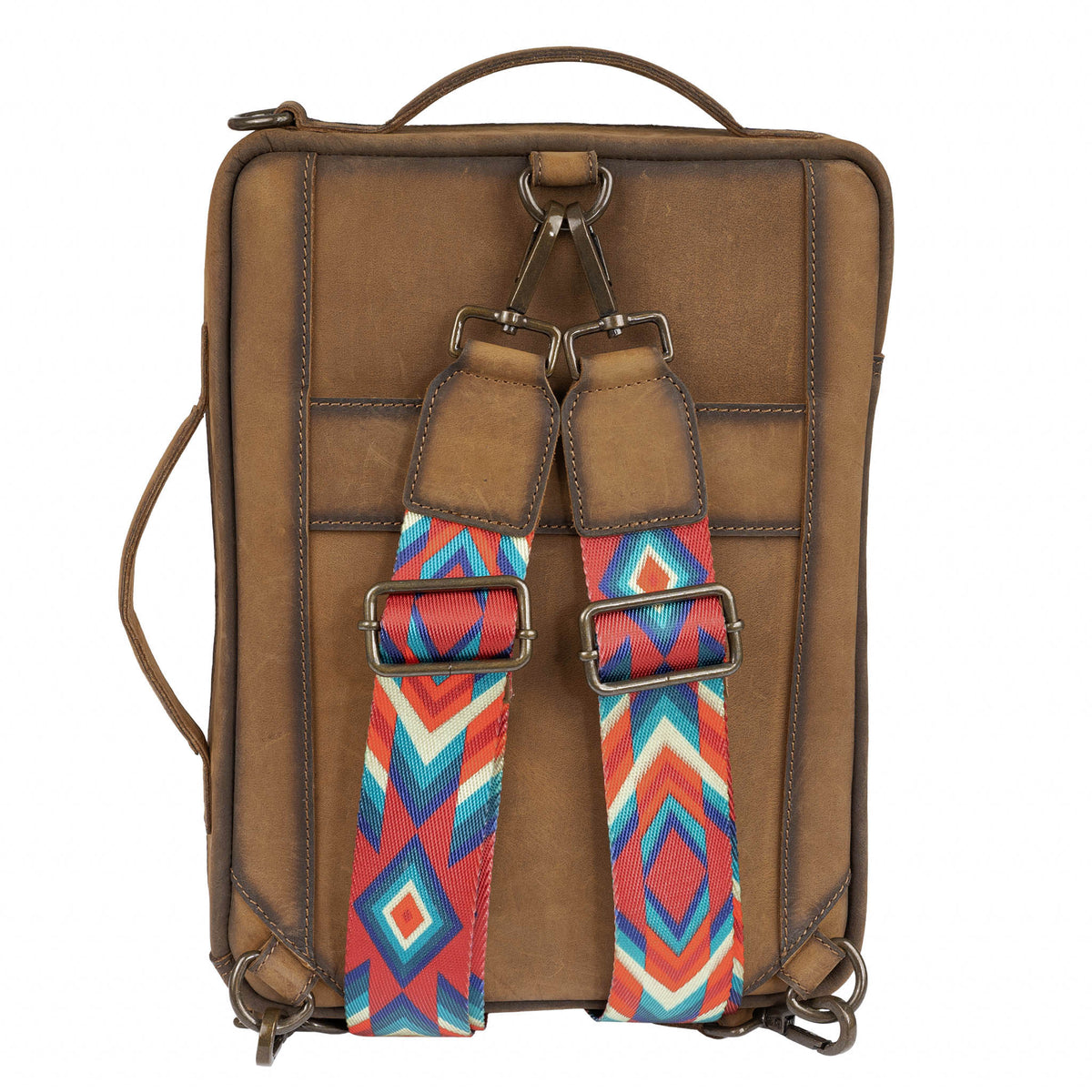 Brown leather bag with colorful nylon backpack straps on a white background.