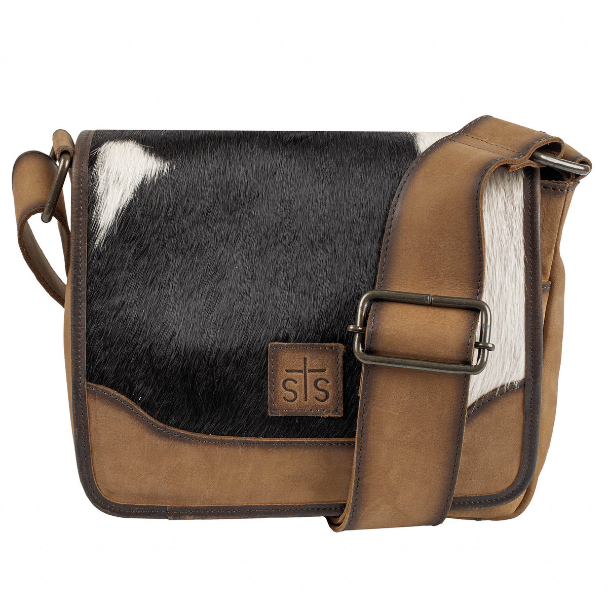 Crossbody handbag black and white cowhide accents, leather strap and brown leather patch featuring embossed STS logo.