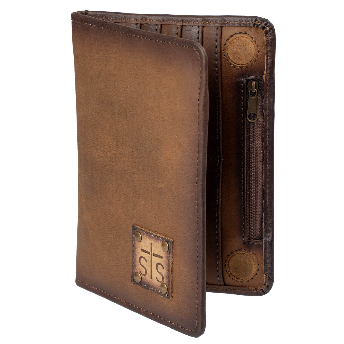 Brown genuine leather magnetic closure wallet with leather STS branded patch in bottom right corner on a white background.