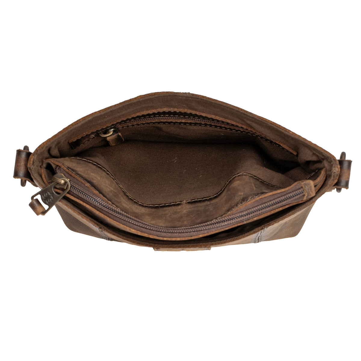 Over head inside view of the storage in a leather crossbody purse on a white background.
