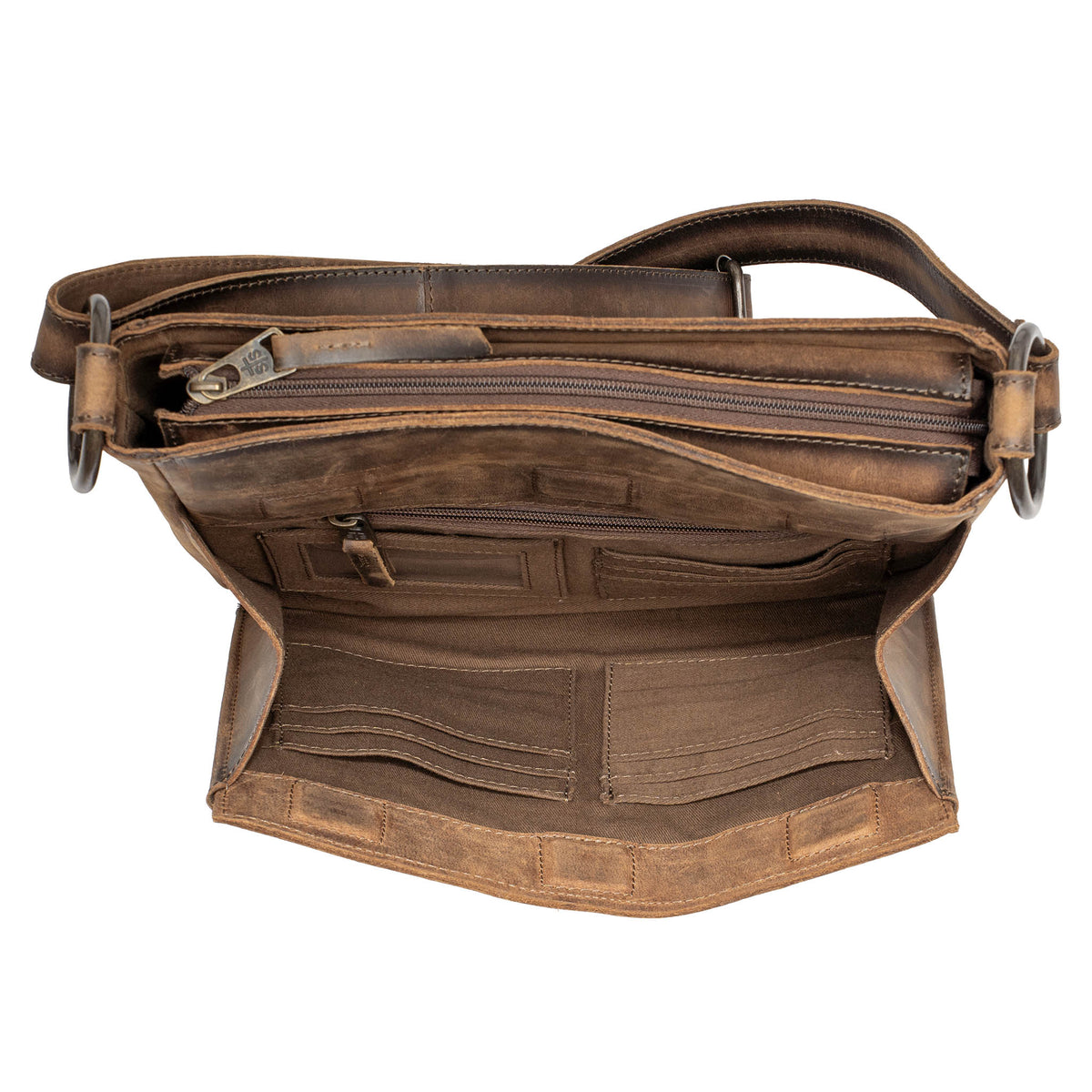 The overhead view of the front storage in a leather crossbody purse on a white background.