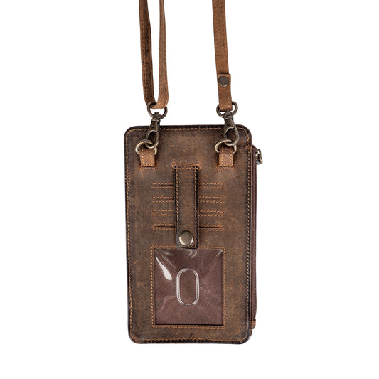 Back of a brown leather phone sling with cowhide accents, ID slot, card slots and adjustable crossbody strap.