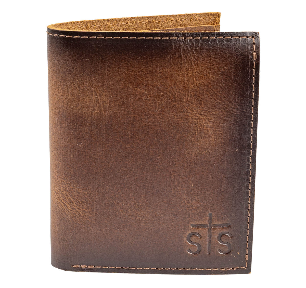 A brown full grain leather bifold wallet with the STS Ranchwear logo embossed on the corner.