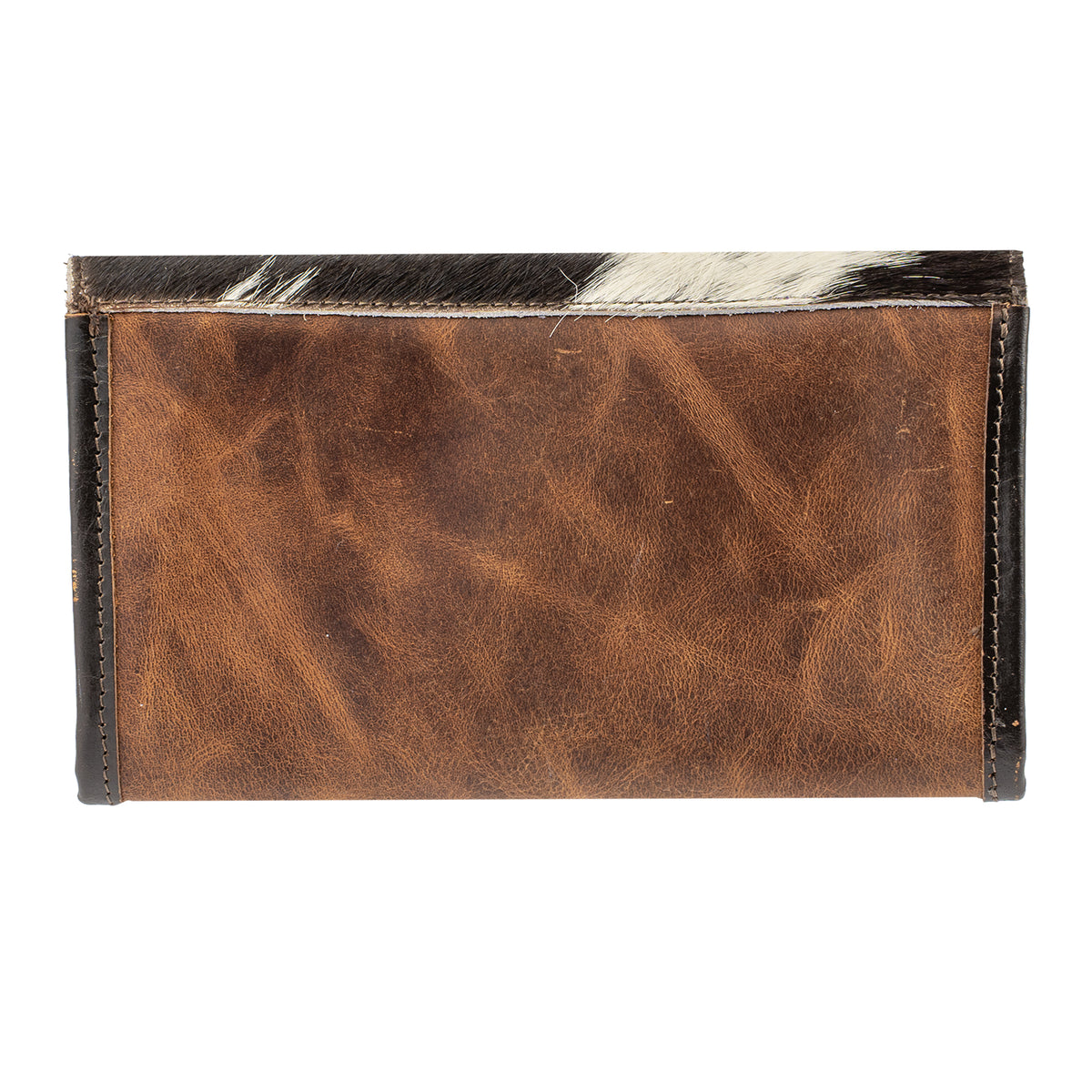 back of our envelope magnetic closure cowhide and leather clutch on white background