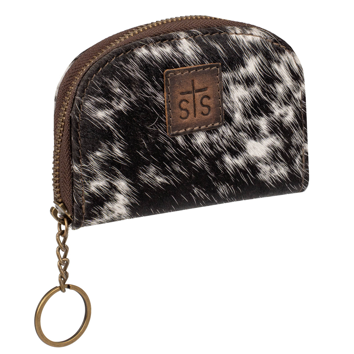 side front view of a cowhide and leather keychain coin purse with a zip around closure on a white background