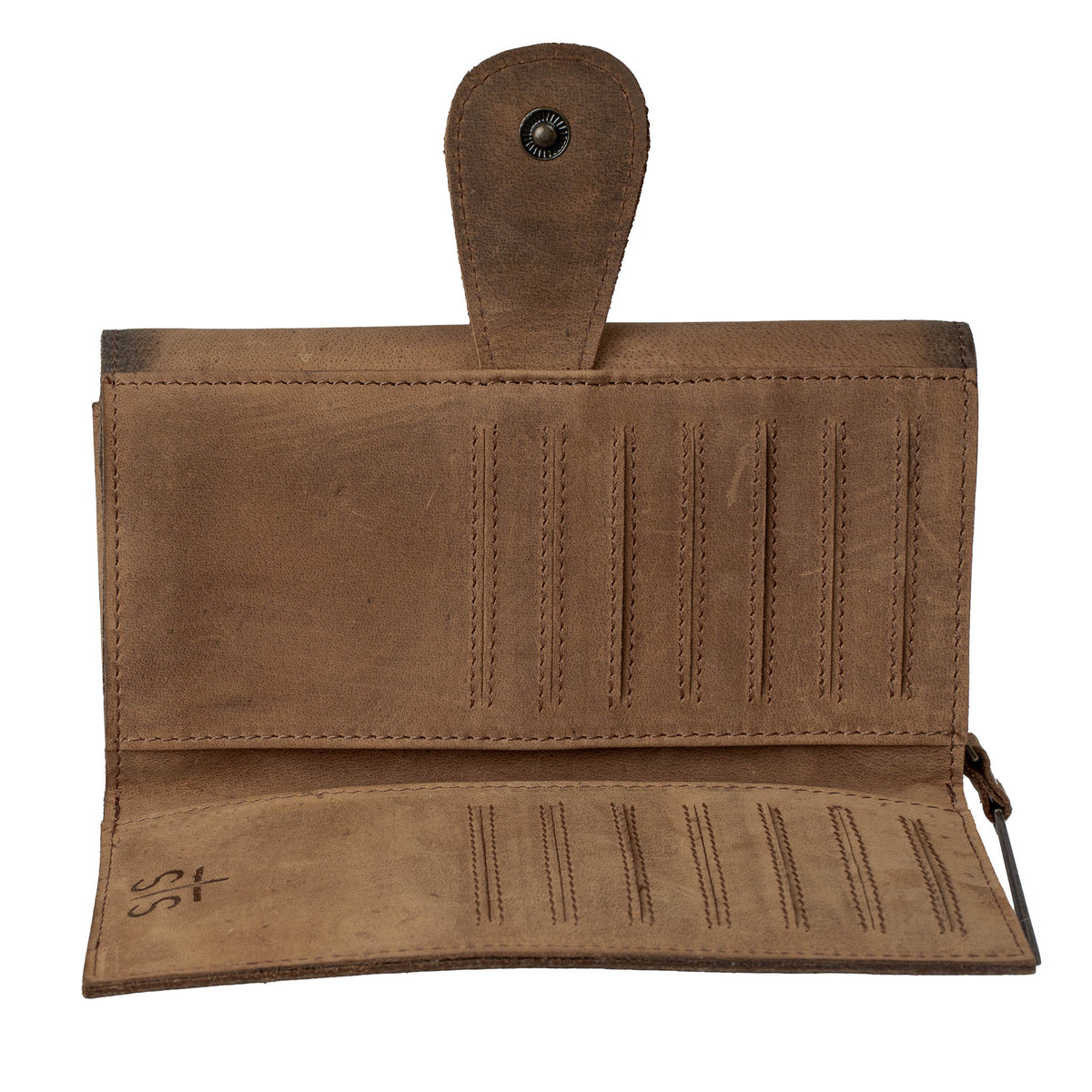 Inside of brown leather trifold wallet with card slots and cash slips on a white background.
