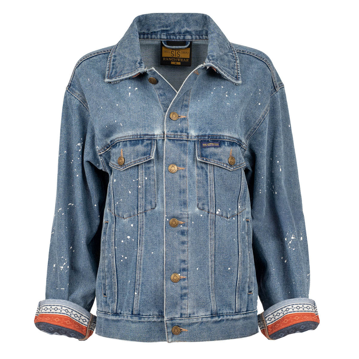 Spackled denim button closure jacket with western patterned sleeve detailing.