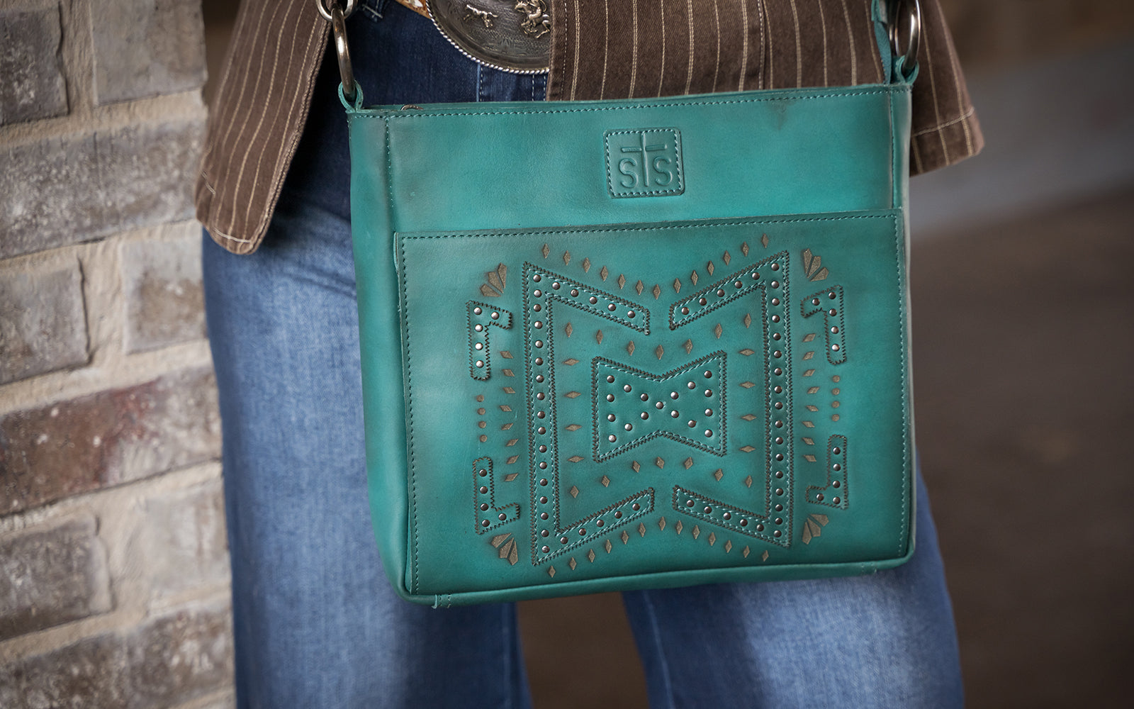 Shop STS Ranchwear's Wayfarer Turquoise leather handbag collection.