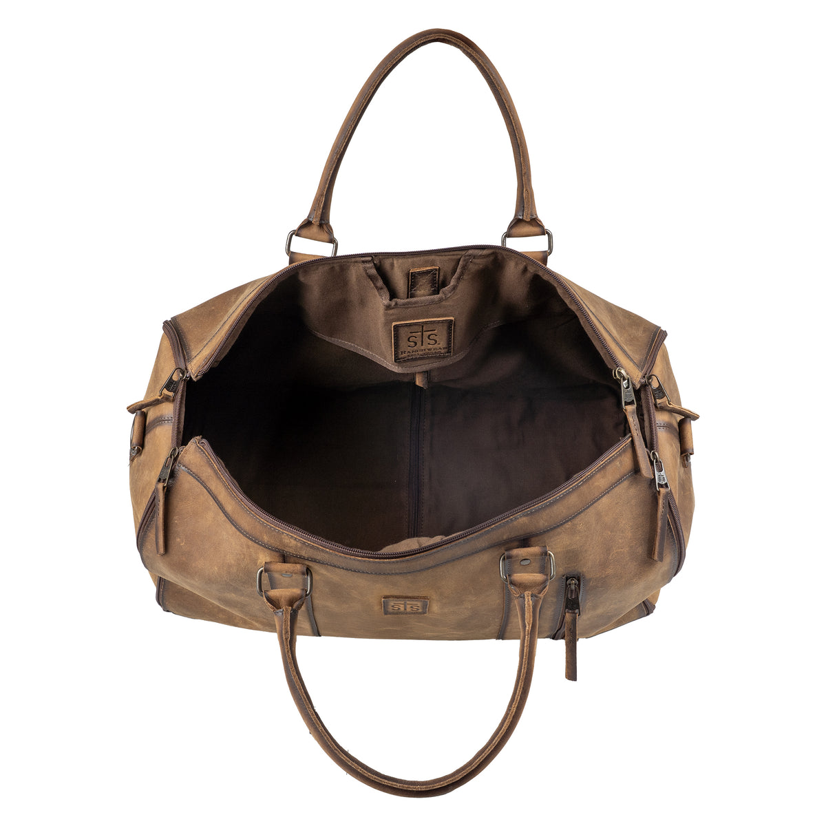 A brown distressed leather duffel bag shown from a top-down view, with its main compartment open to display the interior.