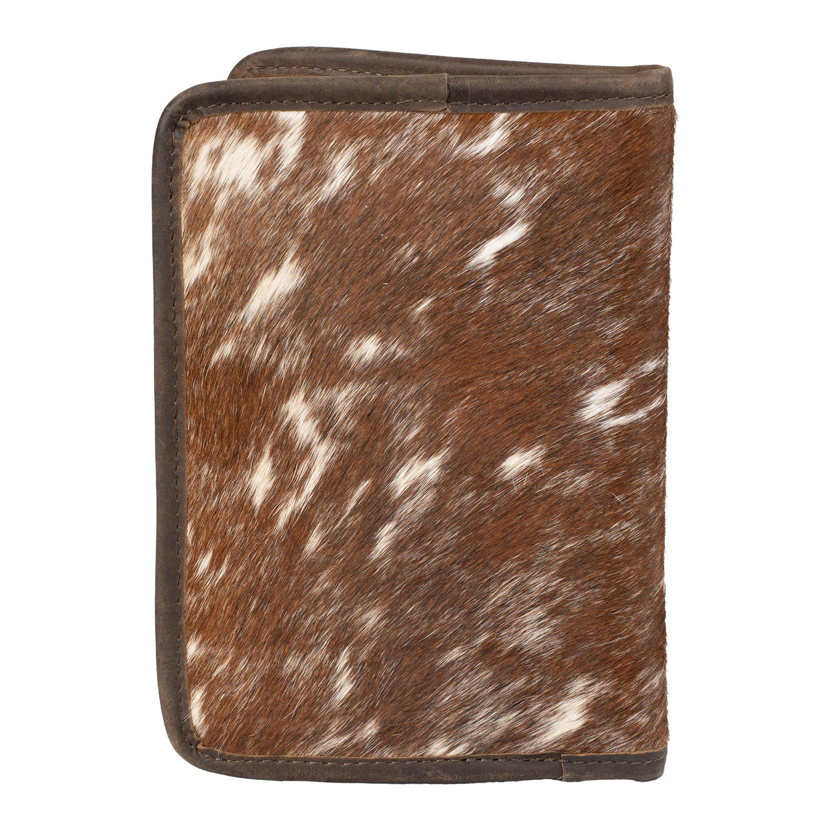 Hair on hide cowhide magnetic closure wallet with brown and white accents on a white background.