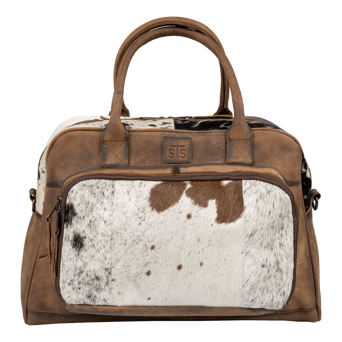 Brown leather bag with cowhide hair on hide accents, zip closure and dual rolled leather handles.
