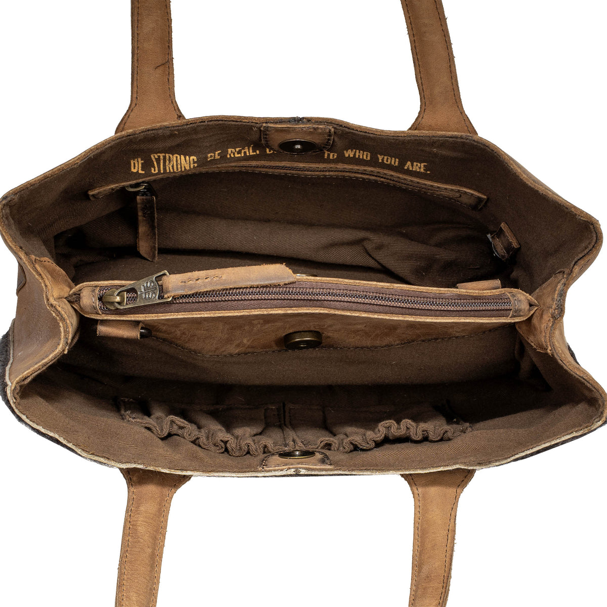 Overhead inside view of a leather purse on a white background
