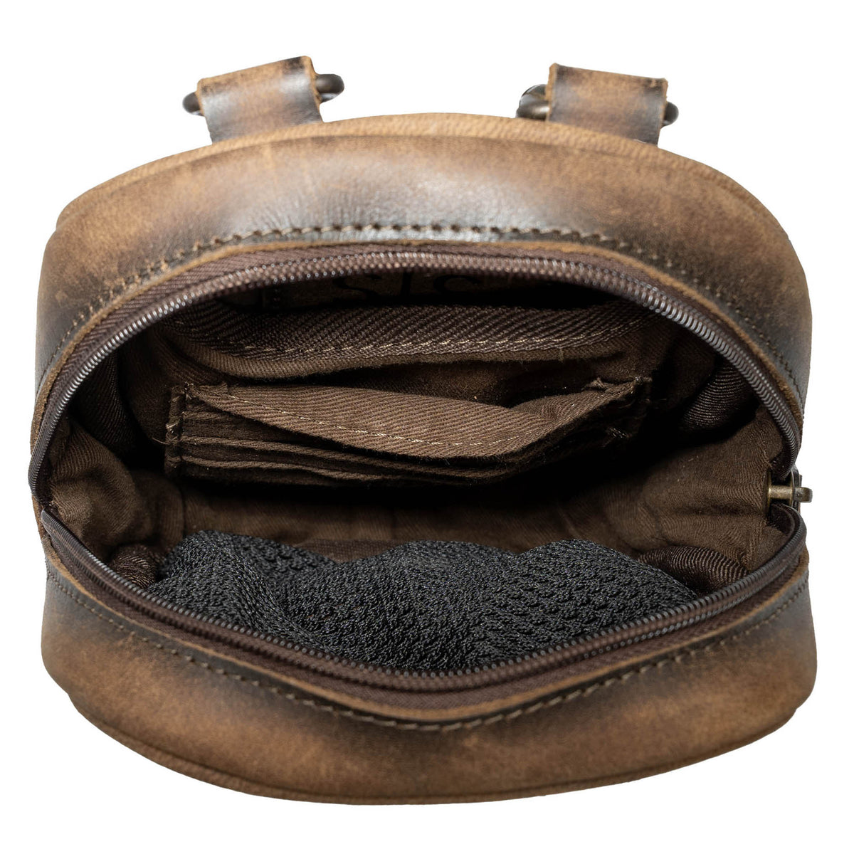 Open overhead view showing the inside storage of a leather crossbody purse on a white background.