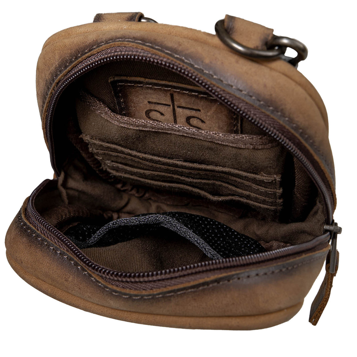 Open overhead view showing the inside storage of a leather crossbody purse on a white background.