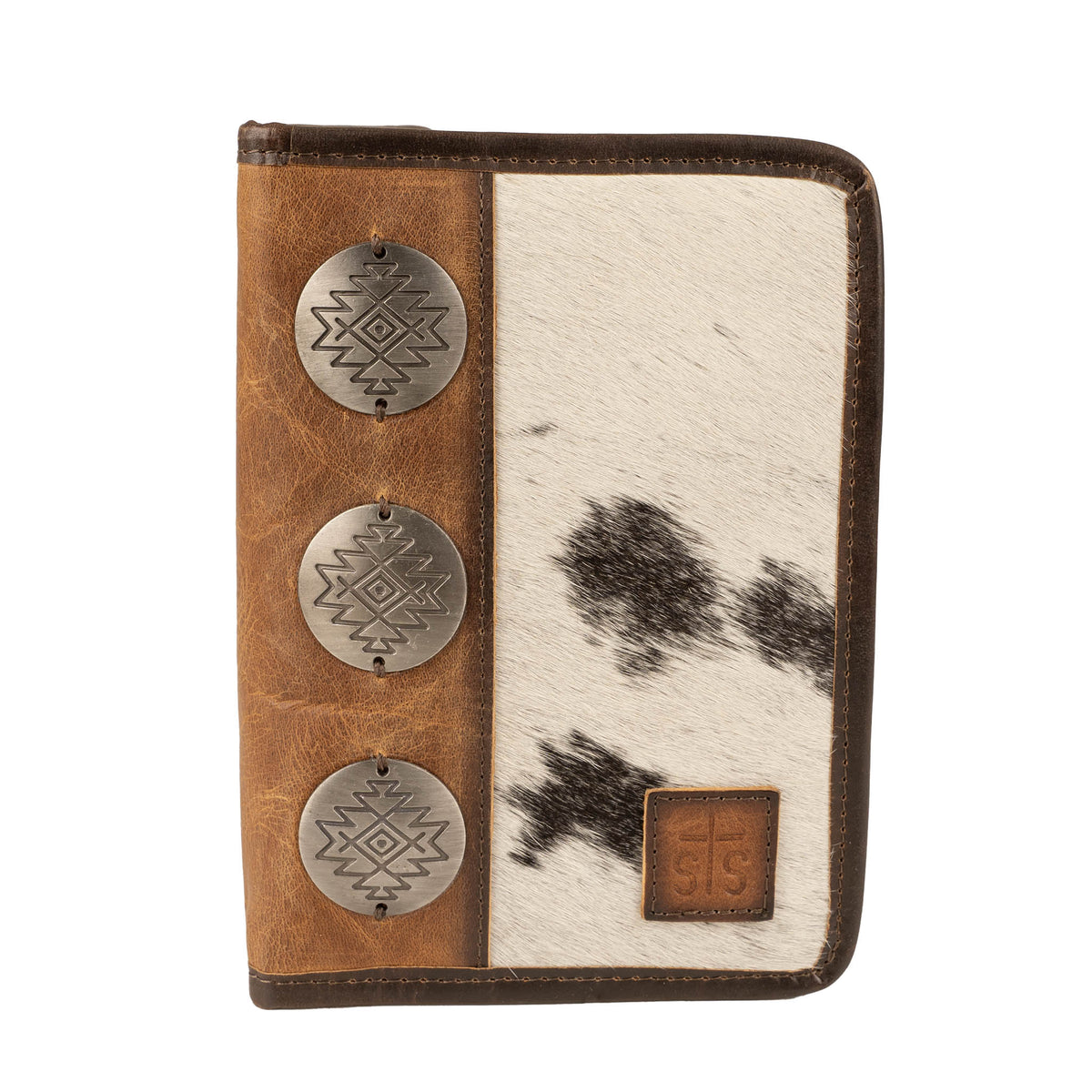 A cowhide magnetic bifold wallet with brown leather edging and three large metal conchos featuring geometric patterns on the front.