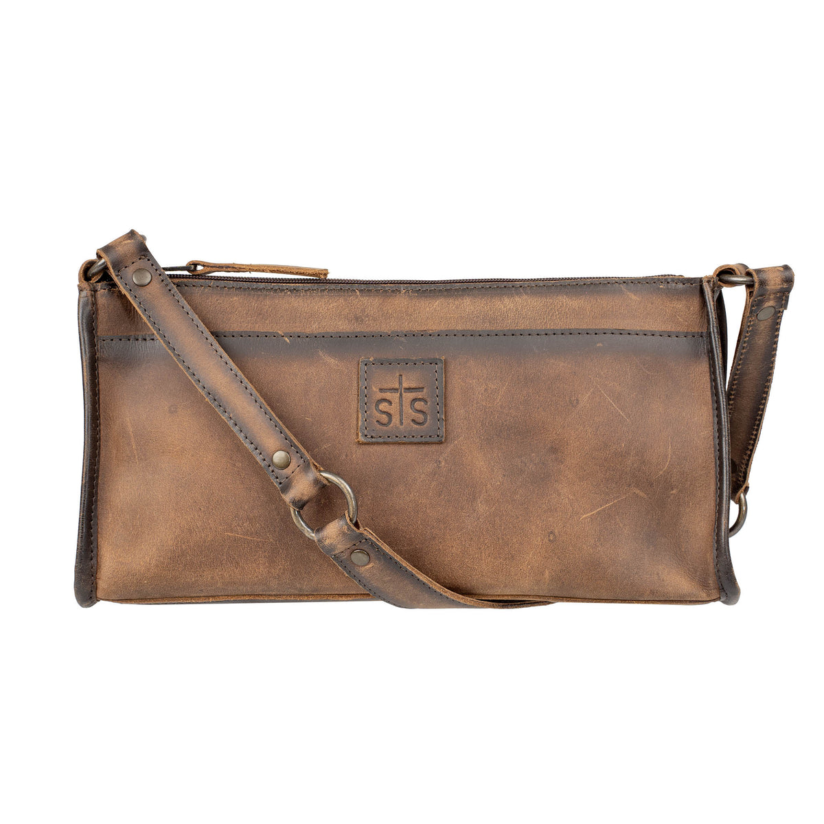 A leather shoulder bag with STS patch on a white background.