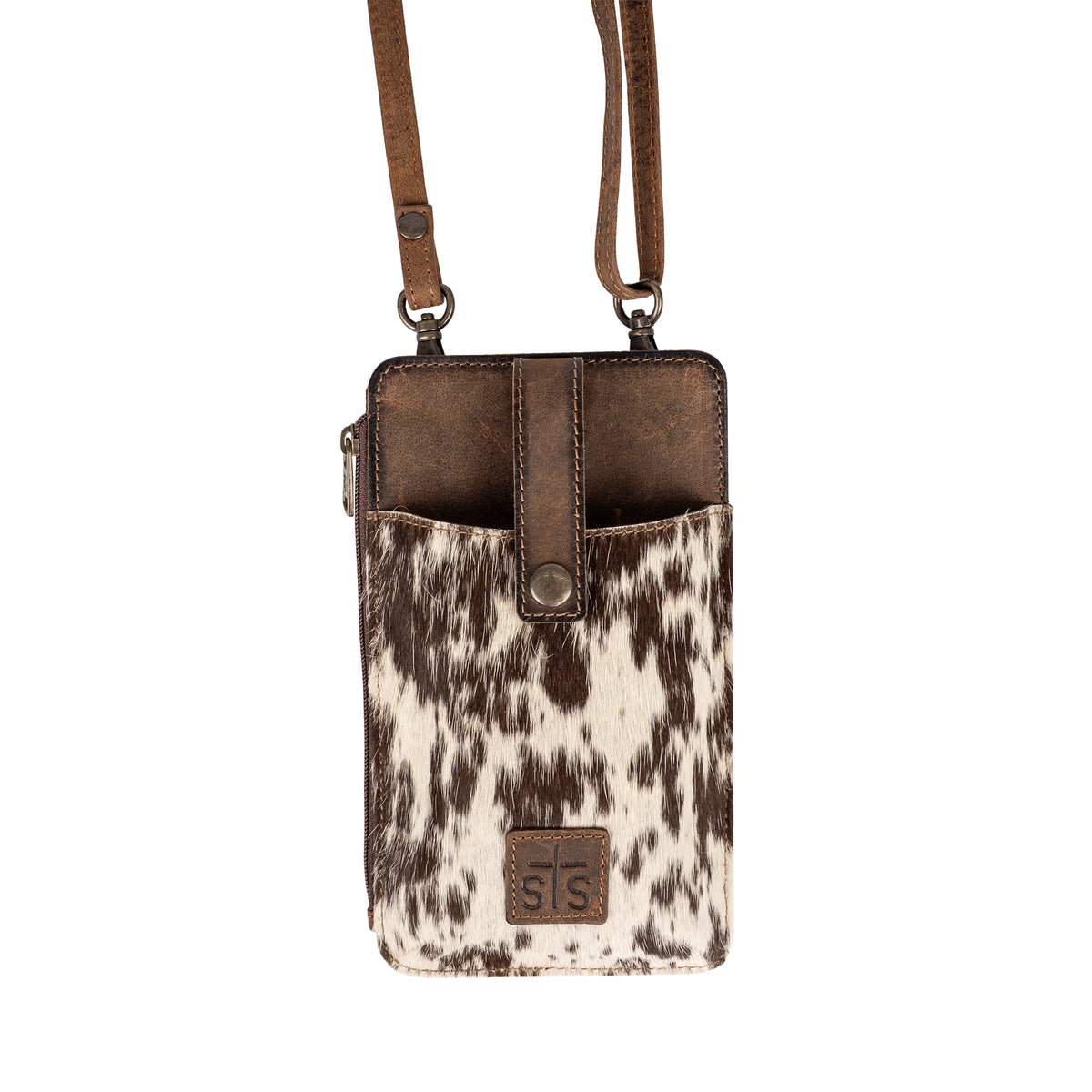 Brown leather phone sling with cowhide accents, snap flap for phone and adjustable crossbody strap.