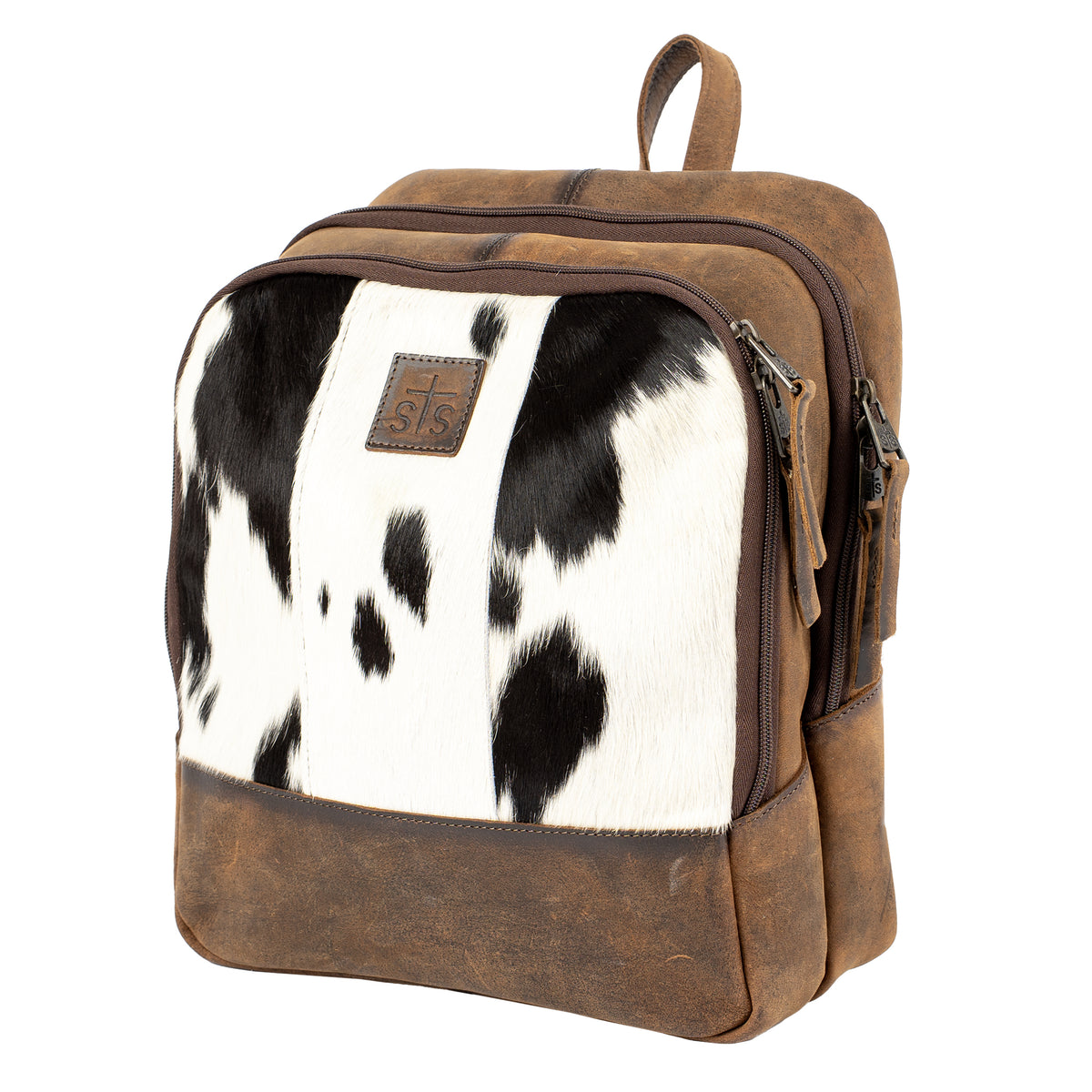 side view of our full grain leather and cowhide backpack with double zip around closure, top carry handle and adjustable straps on white background