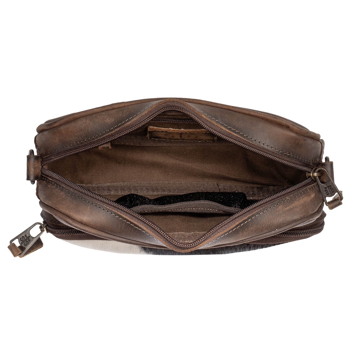 Open top view of a cowhide and leather purse on a white background