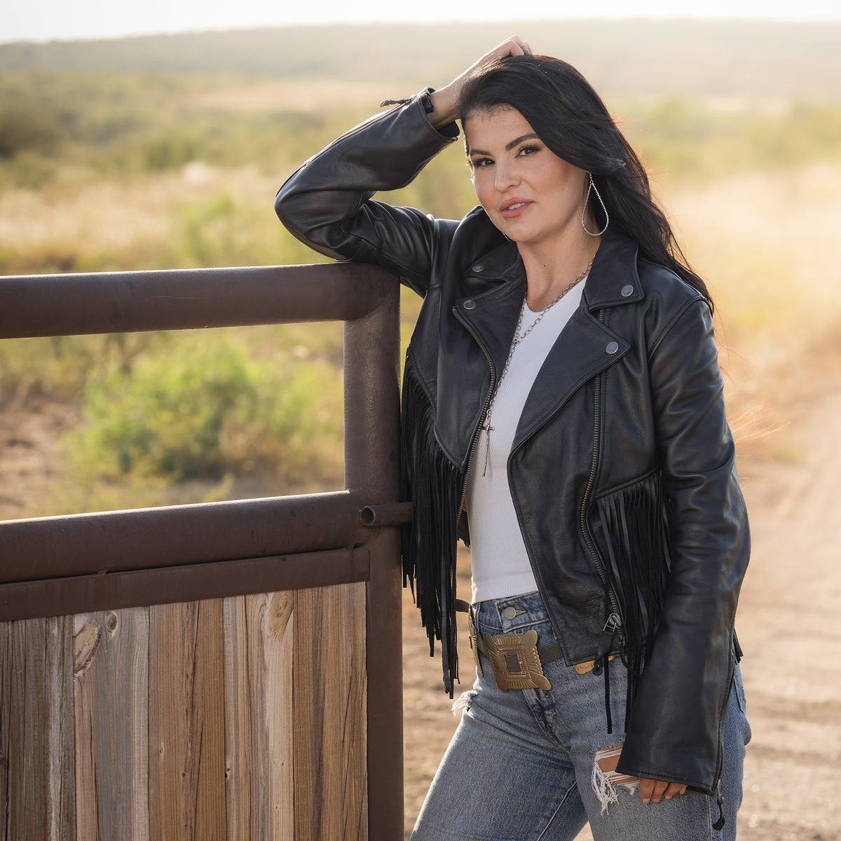 Whitney Vest on STS Ranch wearing our black leather jacket with fringe detailing and asymmetrical zipper front closure 