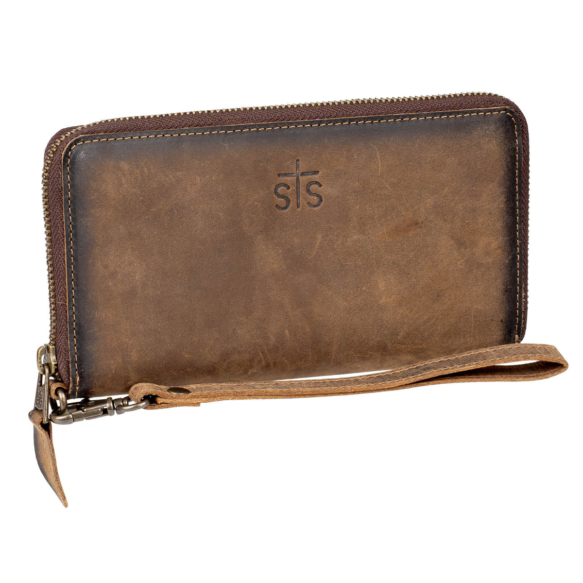 Front side view of an STS embossed leather wristlet with zip around closure.
