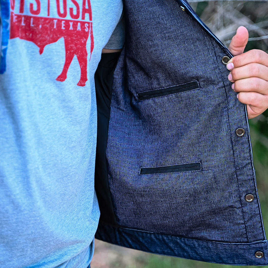 Interior pockets on a youth-sized corduroy jacket in blue.